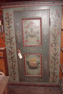 Here we have a beautiful old, pine clothing armoire that was decorated by a Natchez artist.
 